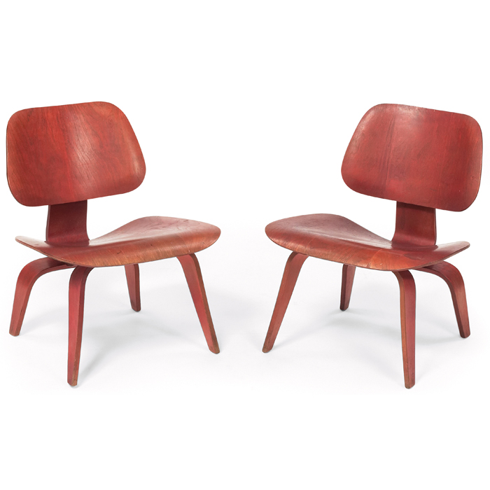 Appraisal: Good Charles and Ray Eames red LCW lounge chairs pair