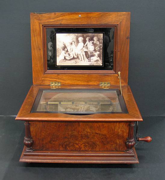 Appraisal: A Swiss music box with additional discs early th century