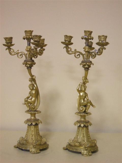 Appraisal: PAIR OF FRENCH GILT-BRONZE CANDELABRA Regence style th century with