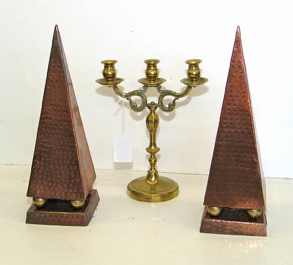 Appraisal: A pair of hammered copper obelisks and a Dutch brass