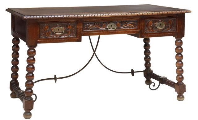 Appraisal: Spanish Baroque style walnut writing desk early th c rectangular