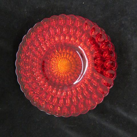 Appraisal: Ruby Glass Plates honeycomb style design excellent