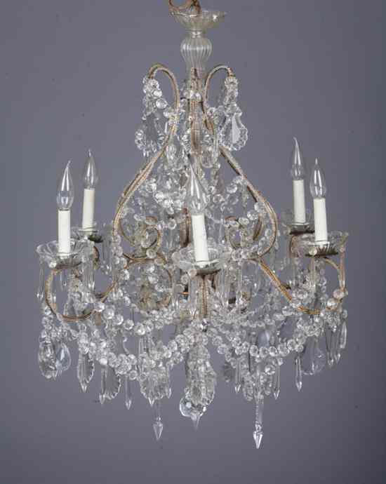 Appraisal: GEORGIAN STYLE CRYSTAL SIX-LIGHT CHANDELIER Scrolling arms having pendant drops