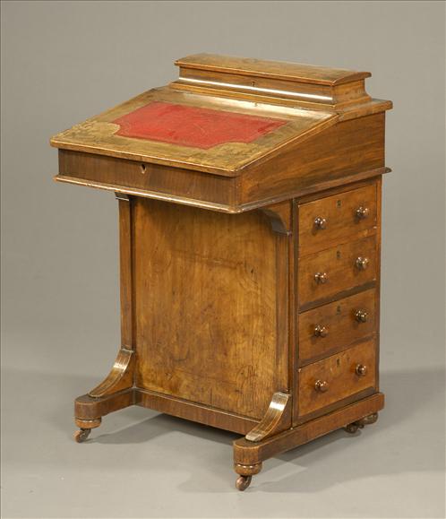 Appraisal: A Victorian walnut davenport circa inlaid with stringing urns and