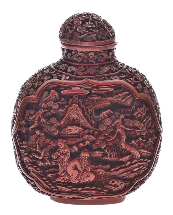 Appraisal: A CARVED CINNABAR SNUFF BOTTLE TH CENTURY