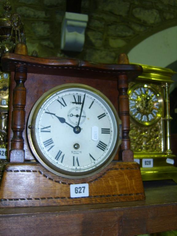 Appraisal: A Smith Astral Marine clock in a brass case with