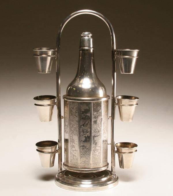 Appraisal: Keystonwear silver cocktail set pivoting shaker engraved with Dutch scenes