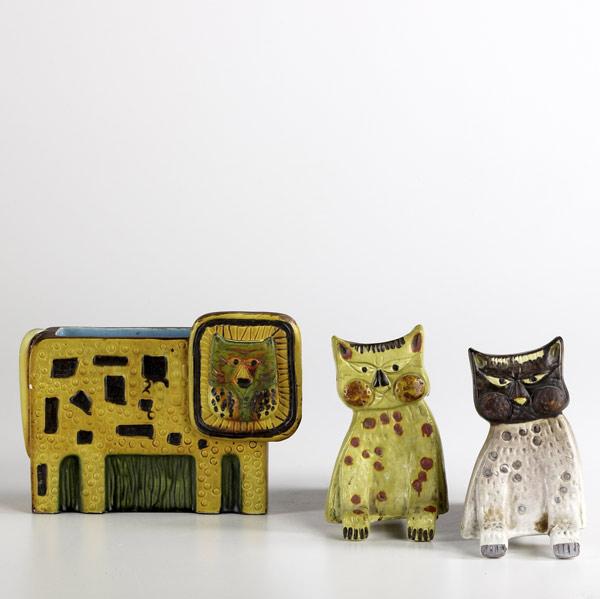 Appraisal: FANTONI Animal group includes lion-shaped vase and a pair of