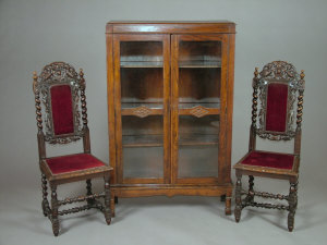 Appraisal: A pair of Victorian barleytwist carved oak side chairs with