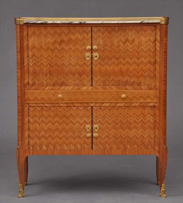 Appraisal: TRANSITIONAL LOUIS XV XVI-STYLE GILT-BRONZE MOUNTED TULIPWOOD MARBLE-TOP BIBLIOTH QUE