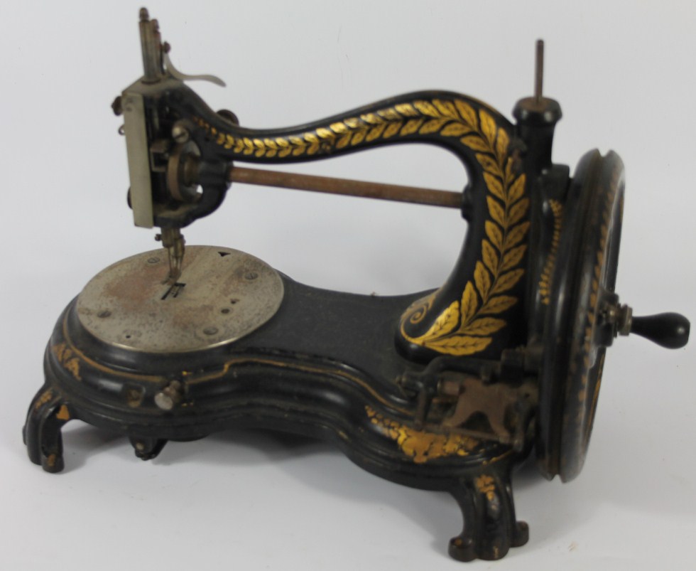 Appraisal: A Wanzer type Canadian box shuttle sewing machine with cast