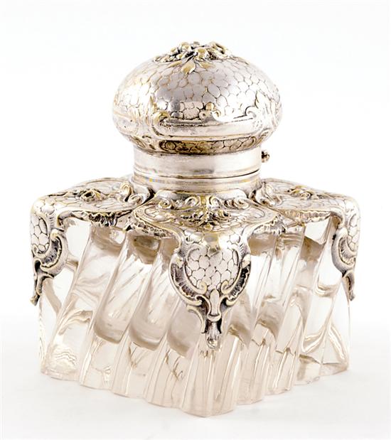 Appraisal: Art Nouveau silverplate and crystal inkpot hinged cover supported by