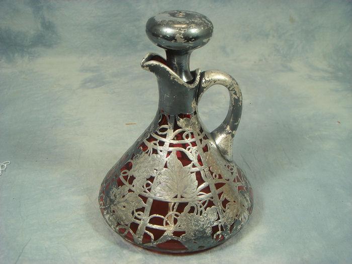 Appraisal: Silver overlay cranberry glass decanter grape vine and cluster design