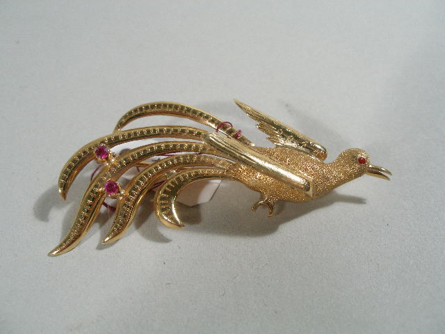 Appraisal: Phoenix Bird Brooch K yellow gold tested with ruby eye