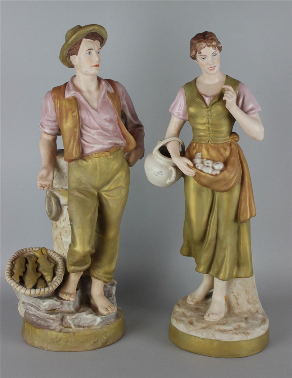 Appraisal: ROYAL DUX PAIR OF FIGURES OF A FISHERMAN AND AN