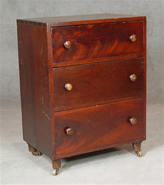 Appraisal: Victorian Walnut Veneer Three-Drawer Chest Circa Dovetailed mahogany stained poplar