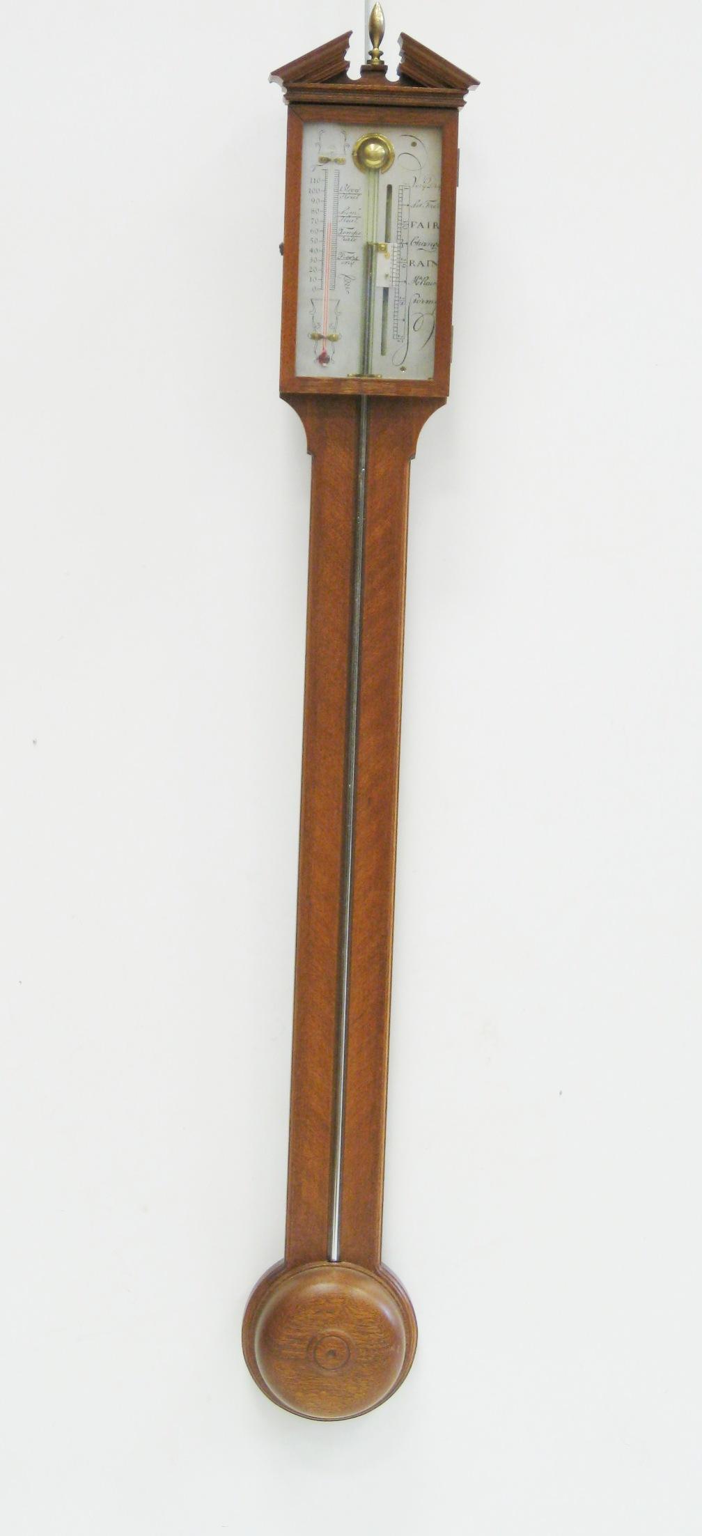 Appraisal: A th Century Stick Barometer with broken pediment and circular