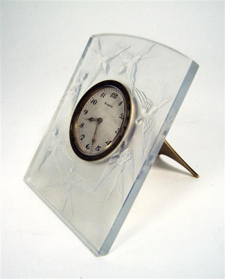 Appraisal: SABINO PARIS STRUT CLOCK S opalescent glass moulded with flying