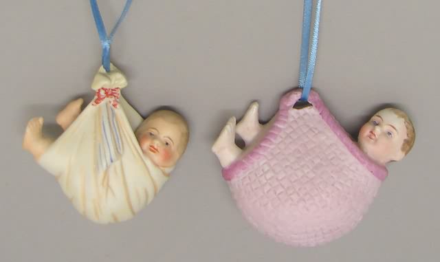 Appraisal: Pair of German bisque Swing baby figurines Each baby is