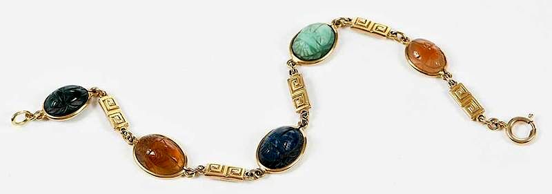 Appraisal: kt Gold Scarab Bracelet five stone carved scarabs including bloodstone