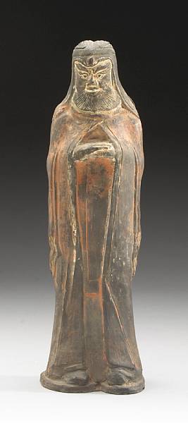 Appraisal: A Han style gray pottery funerary figure The figure representing