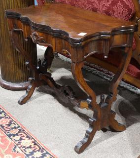 Appraisal: Regency rosewood game table th century having a shaped hinged