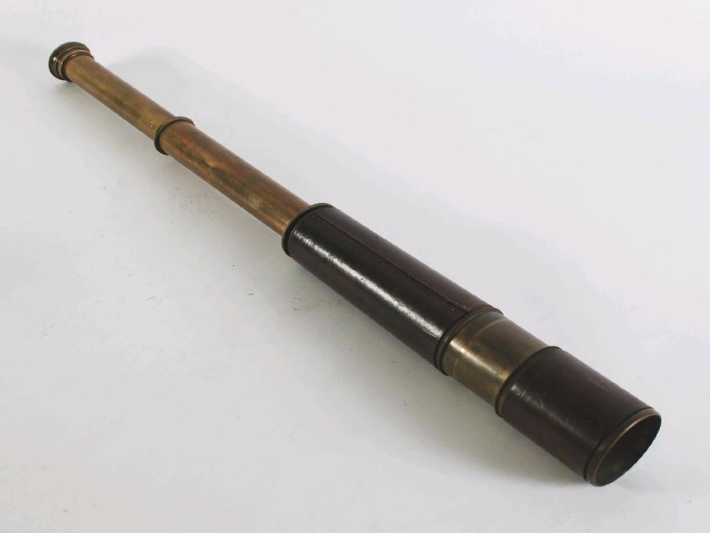 Appraisal: EARLY TWENTIETH CENTURY BRASS AND LEATHER CLAD THREE DRAW TELESCOPE