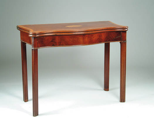 Appraisal: MAHOGANY GEORGE II SERPENTINE FRONT CARD TABLE The fold over