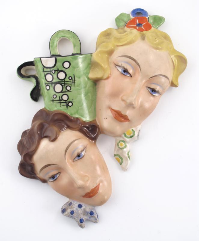 Appraisal: A Czechoslovakian pottery double wall mask