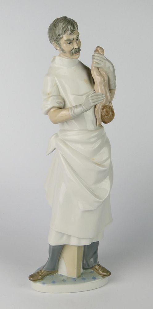 Appraisal: LLADRO OBSTETRICIAN PORCELAIN FIGURE LLADRO OBSTETRICIAN PORCELAIN FIGURE Condition All