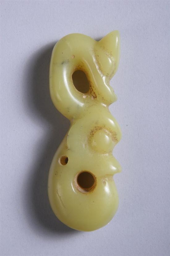 Appraisal: CHINESE YELLOW JADE DOUBLE DRAGON PENDANT Hongshan period - in