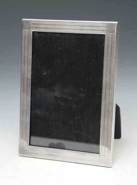 Appraisal: TIFFANY CO SILVER PHOTO FRAME with engraved decoration tall