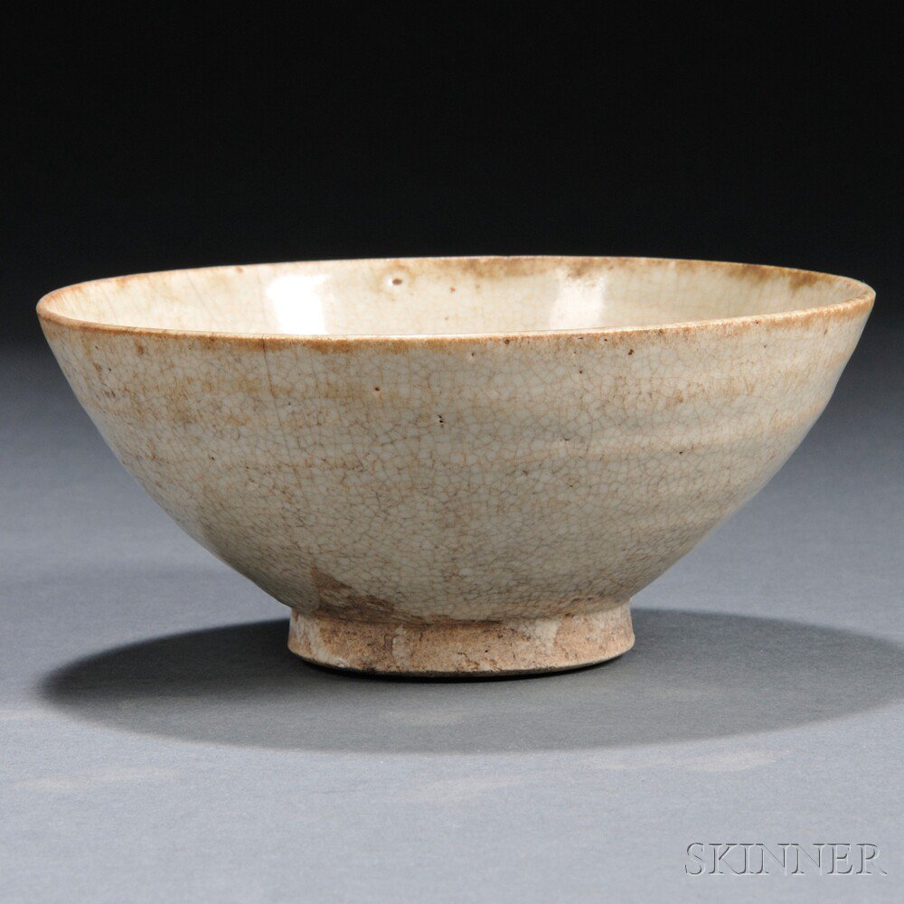 Appraisal: Plain White-glazed Ding Bowl China softly rounded body resting on