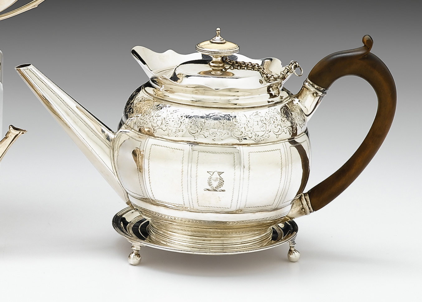 Appraisal: George III sterling silver teapot on stand solomon hougham or