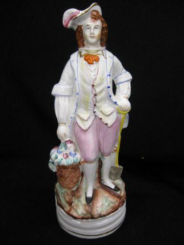 Appraisal: Staffordshire Pottery Figurine of Man gardening excellent