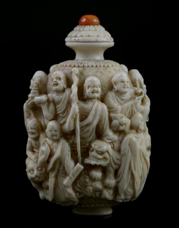 Appraisal: Exquisite Qing era carved Chinese snuff bottle depicting a seated