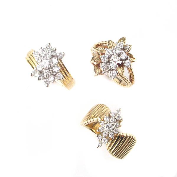 Appraisal: A collection of four diamond and gold rings four rings