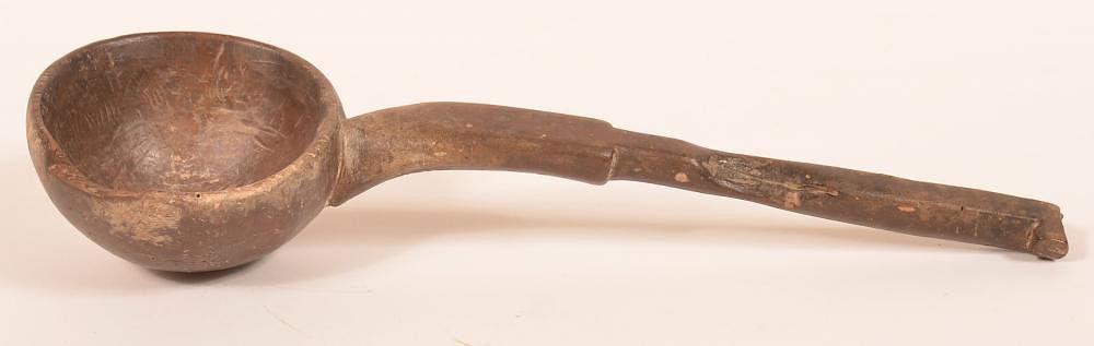 Appraisal: th Century Single Piece Carved Ladle th Century Single Piece