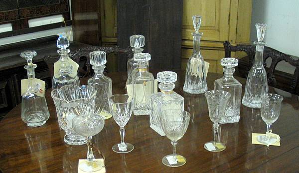 Appraisal: An assembled group of nine cut glass decanters vase and