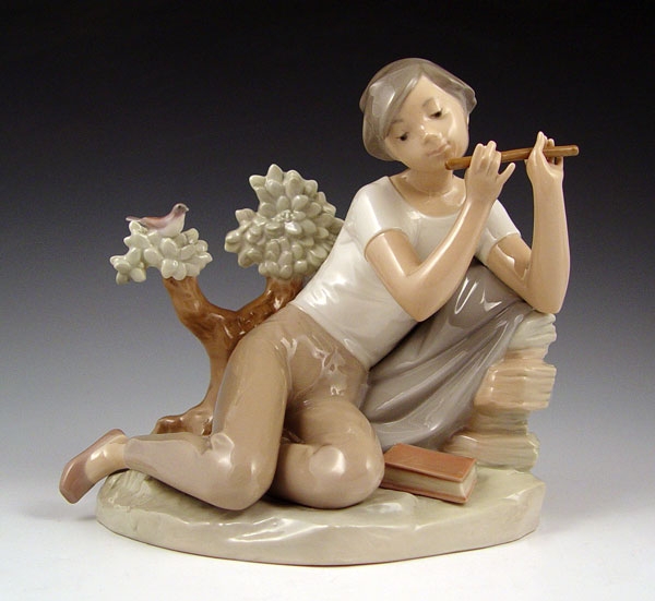 Appraisal: LLADRO STUDENT FLUTE PLAYER Retired in '' high