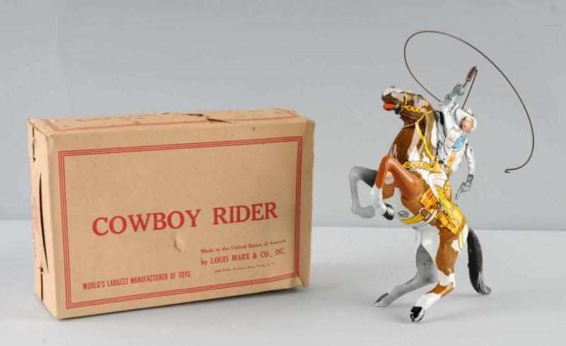 Appraisal: Tin Marx Cowboy Rider Wind-Up Toy Description American Working Original