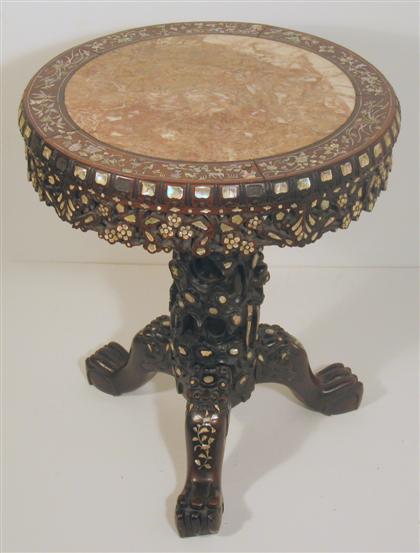 Appraisal: Chinese hongmu round table th th century Elaborately carved with