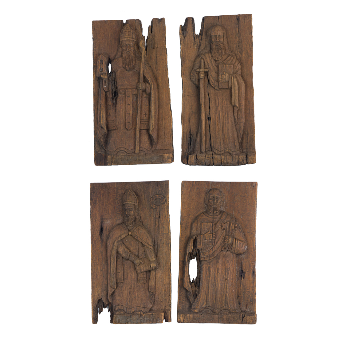 Appraisal: A SET OF SPANISH COLONIAL CARVED WOOD ARCHITECTURAL PANELS DEPICTING