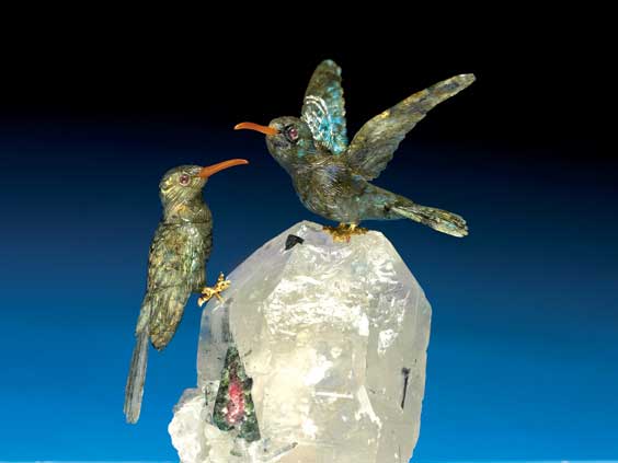 Appraisal: PAIR OF SHIMMERING LABRADORITE HUMMINGBIRDS ON BASE OF TOURMALINE QUARTZ