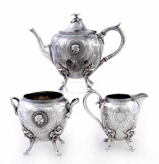 Appraisal: Meriden Medallion pattern silverplate tea service circa stippled and bright-cut