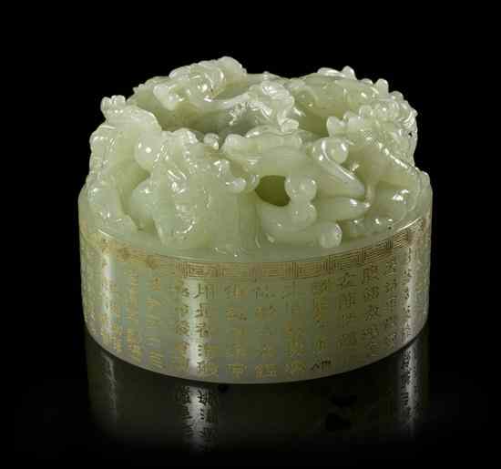 Appraisal: A Jade Carved Circular Seal Stamp of pale green colored