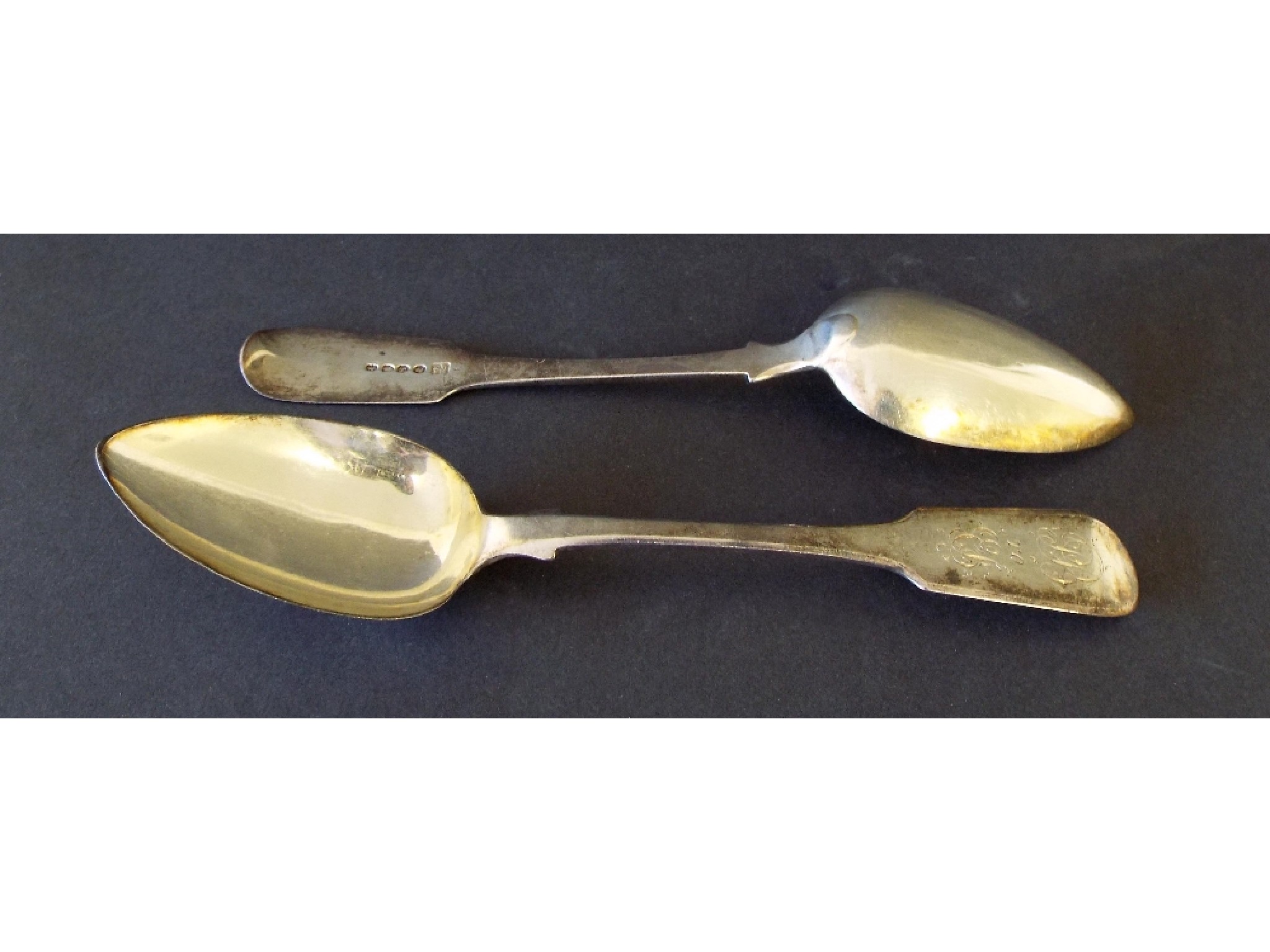 Appraisal: Pair of Georgian silver fiddle pattern table spoons maker TWJH