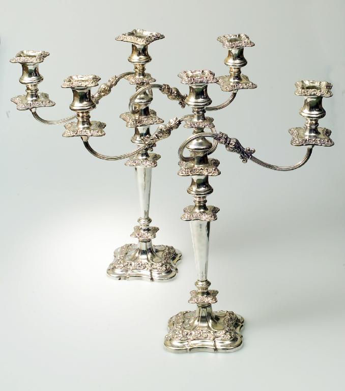 Appraisal: PAIR OF LARGE SILVER-PLATED THREE-LIGHT CANDELABRA IN th CENTURY STYLE