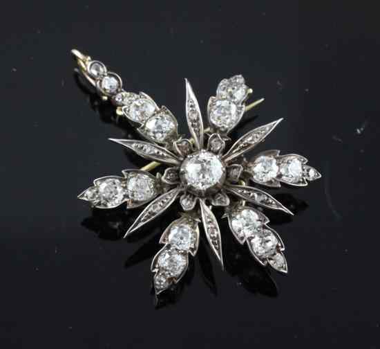 Appraisal: A late Victorian diamond set gold and silver brooch pendant