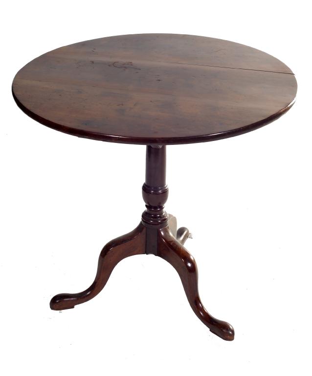 Appraisal: GEORGE III MAHOGANY TRIPOD TABLE the circular top raised on